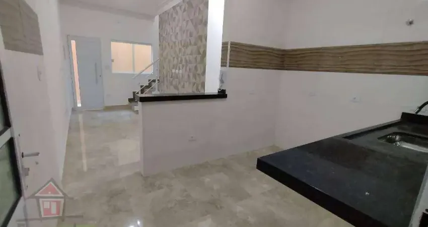 Sobrado novo em condomínio no lado praia com 2 dormitórios à venda, 54 m² por r$ 350.000  guilhermina  praia grande sp