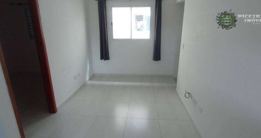 Casa de condomínio com 2 dormitórios à venda, 60 m² por R$ 290.000 - Aviação - Praia Grande/SP