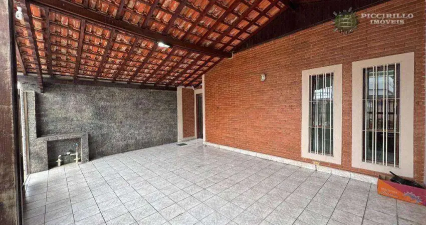 Casa com 3 dormitórios à venda, 100 m² por R$ 680.000 - Vila Guilhermina - Praia Grande/SP