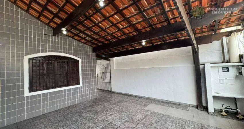 Casa com 3 dormitórios à venda, 71 m² por R$ 590.000 - Vila Guilhermina - Praia Grande/SP
