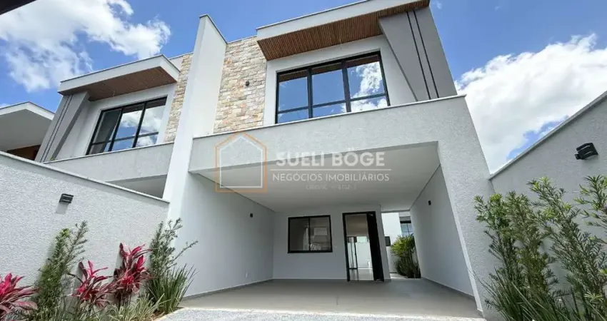 Sobrado geminado novo com 3 suítes e 2 vagas de garagem lado a lado