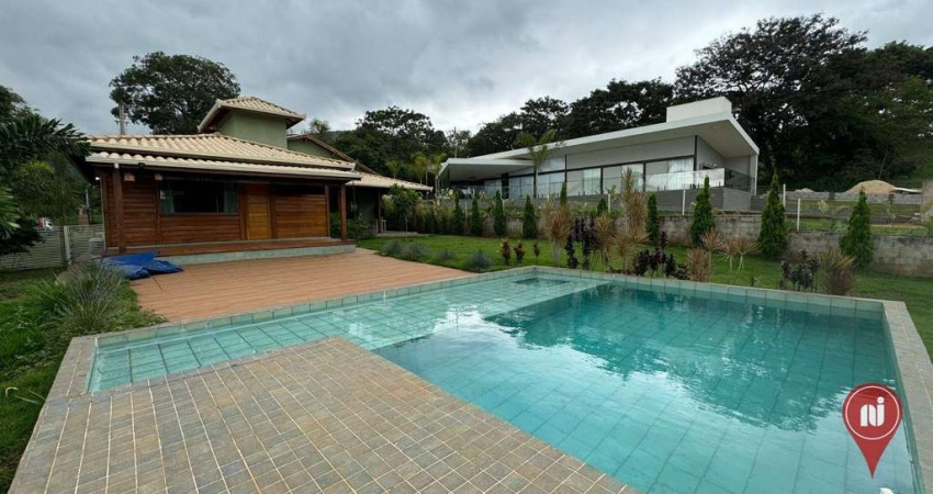 Casa com 3 dormitórios à venda, 200 m² por R$ 1.200.000,00 - Condomínio Serra dos Bandeirantes - Mário Campos/MG