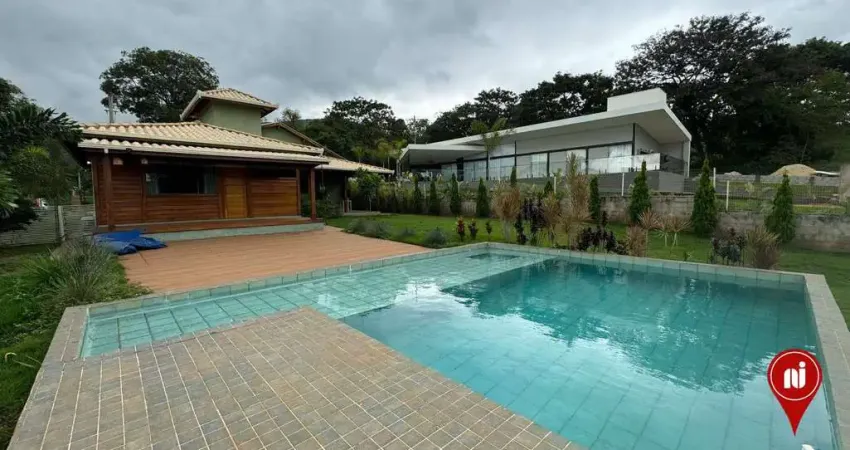 Casa com 3 dormitórios à venda, 200 m² por R$ 1.150.000,00 - Condomínio Serra dos Bandeirantes - Mário Campos/MG