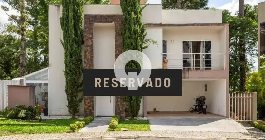 Casa ensolarada à venda - 3 suítes e terreno privativo grande em condomínio no bacacheri