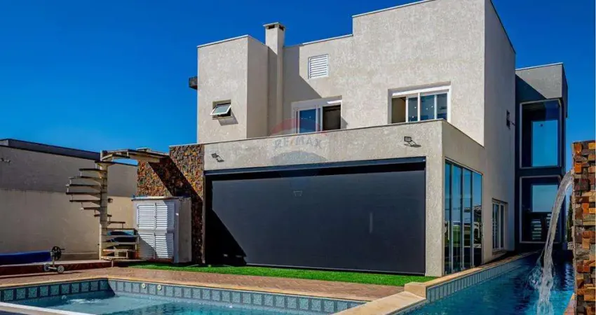Casa de alto padrão com 04 suítes, casa de hóspedes, piscina semi-olímpica em condomínio fechado