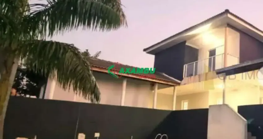 SOBRADO COM 5 DORMITÓRIOS (1 SUITE MASTER), SALA INTEGRADA COM ESPAÇO GOURMET E PISCINA