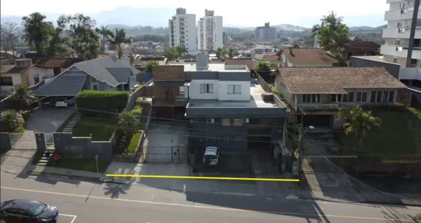 Terreno com casa e galpão Comercial Costa e Silva Joinville.