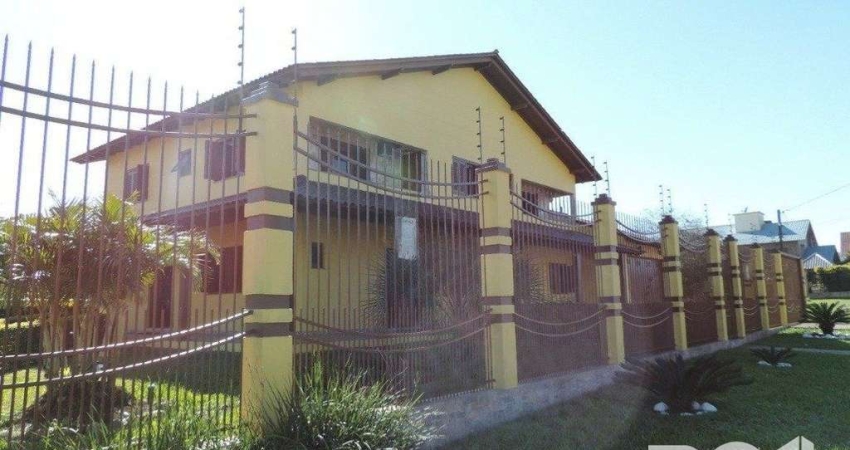 Casa 4 dormitórios à venda Parque Santa Fé Porto Alegre/RS
