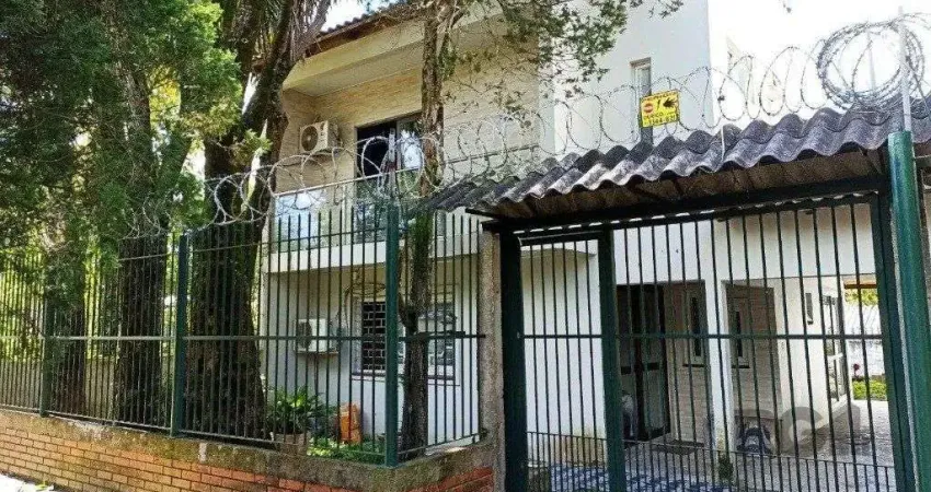 Casa com 3 quartos à venda na Rua Lauro Rodrigues, 590, Costa e Silva, Porto Alegre