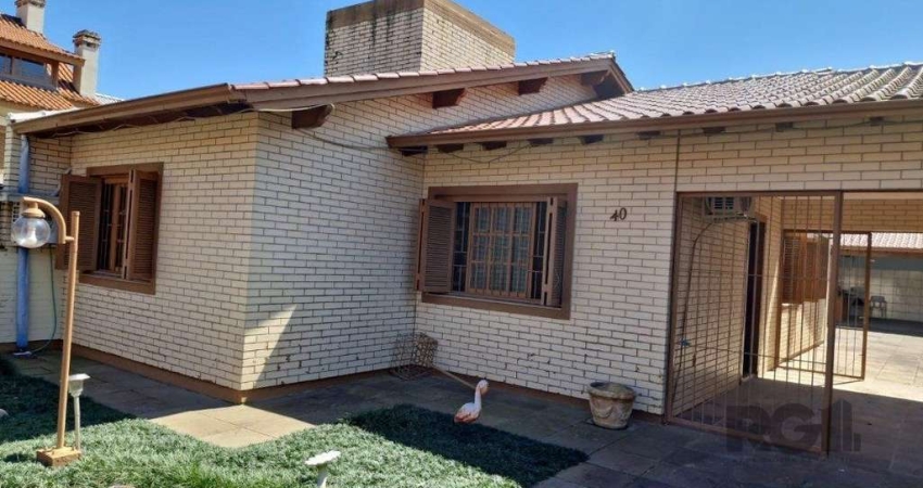 Casa 2 dormitórios à venda Guarujá Porto Alegre/RS