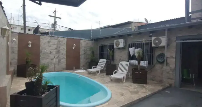 Casa no bairro Restinga com piscina com 4 dormitórios
