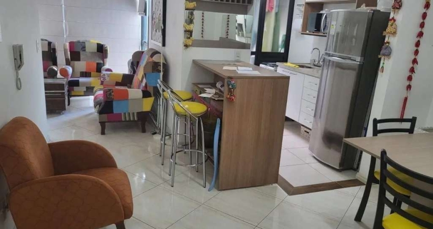 Apartamento com 1 quarto e 53m² à venda em Menino Deus, Porto Alegre.