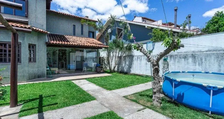 Casa com 4 quartos à venda na Rua Jayme Saul de Borba, 21, Espírito Santo, Porto Alegre