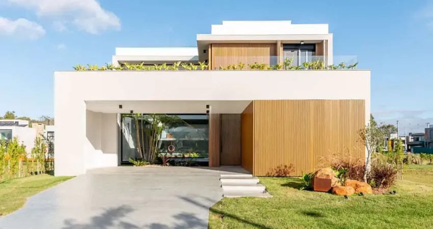 Linda casa para comprar com 4 suites em condomínio TOP