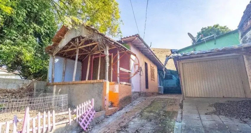 Terreno grande com casas no morro santana, ao lado do atacado cestto