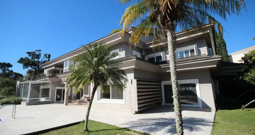 Casa alto padrão em condomínio fechado - 4 suítes, vista panorâmica