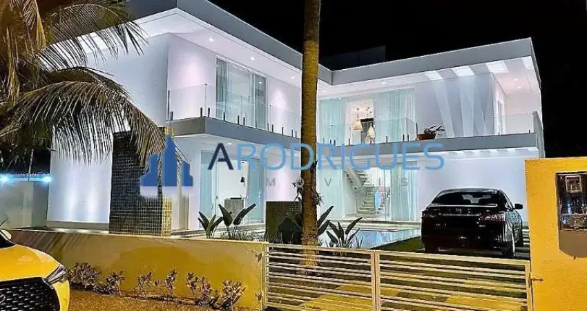Casa à Venda de Alto Padrão em Guarajuba, Camaçari-BA: 6 quartos, 6 suítes, 3 salas, 8 banheiros, 3 vagas de garagem, 365m² de área.