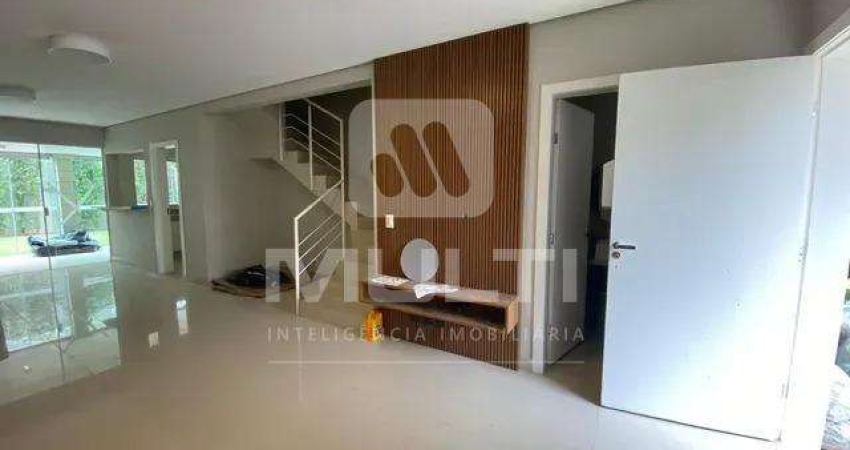 Casa em condomínio fechado com 3 quartos para alugar no Jardim Karaíba, Uberlândia 