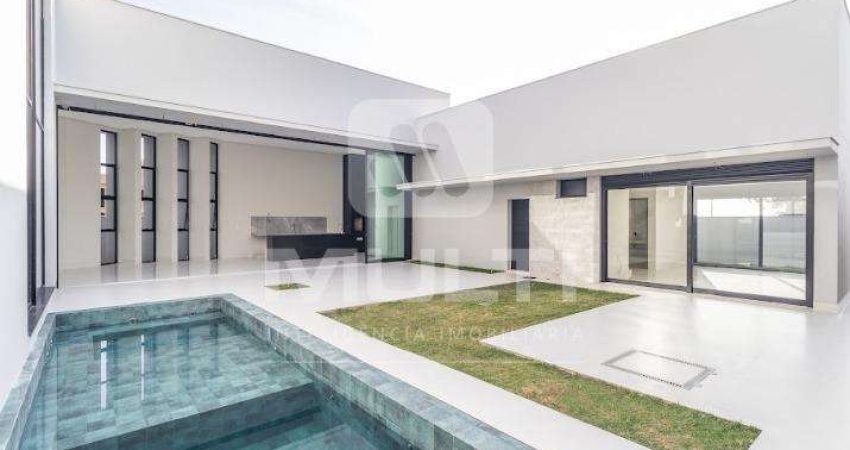 Casa em condomínio fechado com 3 quartos para alugar no Buritis, Uberlândia 