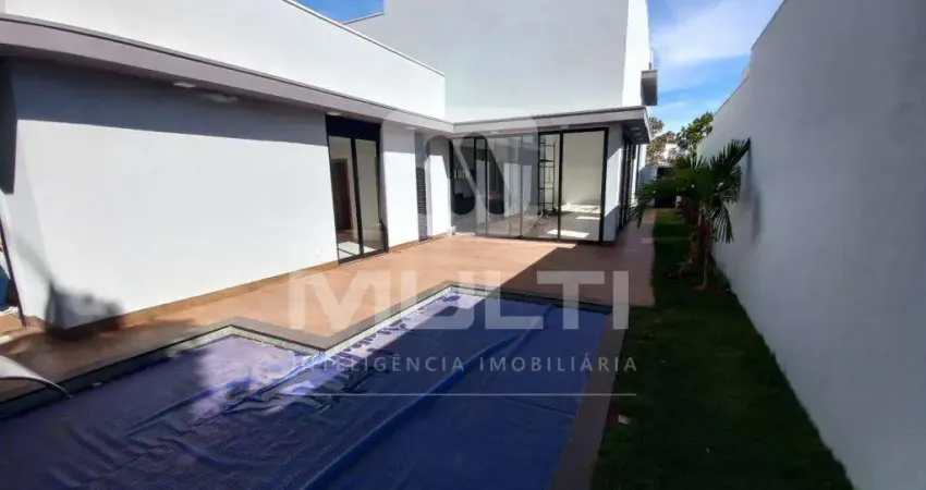 Casa em condomínio fechado com 4 quartos para alugar no Alphaville, Uberlândia 