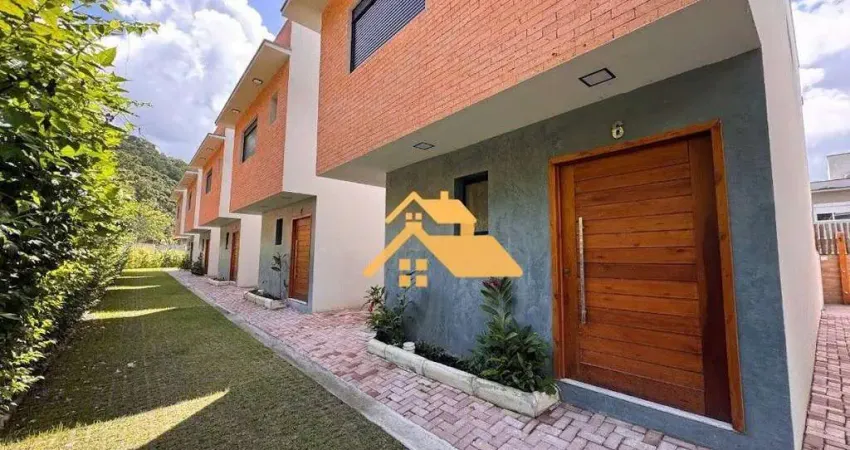 Sobrado com 3 dormitórios à venda, 135 m² por r$ 1.700.000,00 - praia de camburi - são sebastião/sp