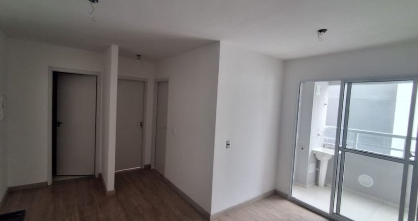 Apartamento de 2 dormitórios com varanda e vaga de garagem