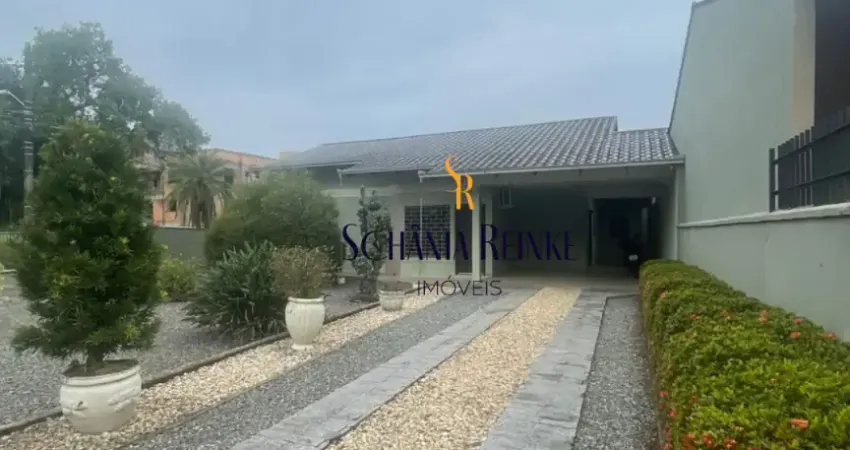 Casa com piscina averbada iririú com 1 suíte mais dois dormitórios