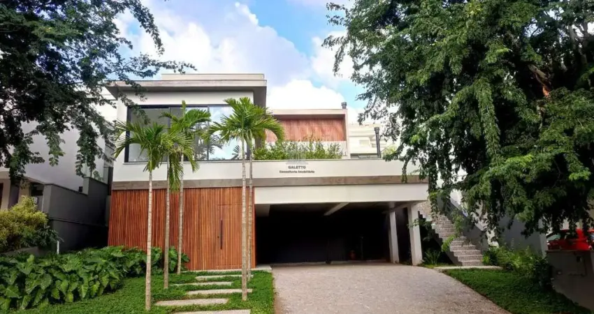 Casa para venda em alphaville dom pedro 3 de 360.00m² com 4 quartos, 4 suites e 4 garagens