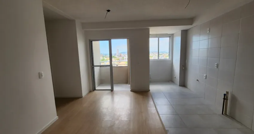 Apartamento 2 dorm sacada c/ churrasqueira 1 vaga perto da praia