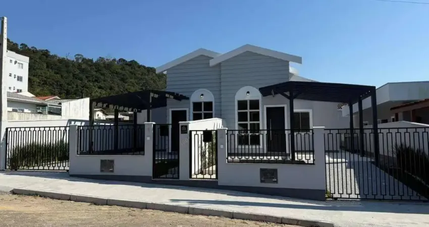 Venda: casa 3 quartos sendo 1 suíte, geminada, 1 vaga, 80m² privativos, biguaçu, sc - br