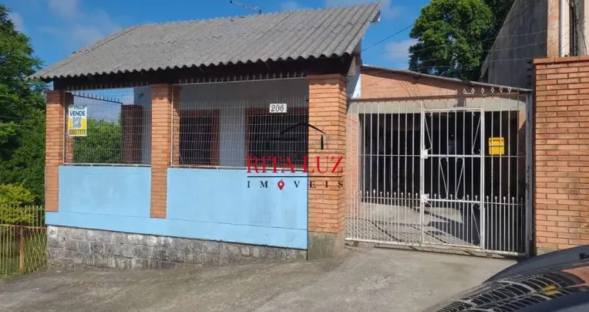 Casa com 6 quartos à venda na Rua Martim Minaberry, 206, Partenon, Porto Alegre