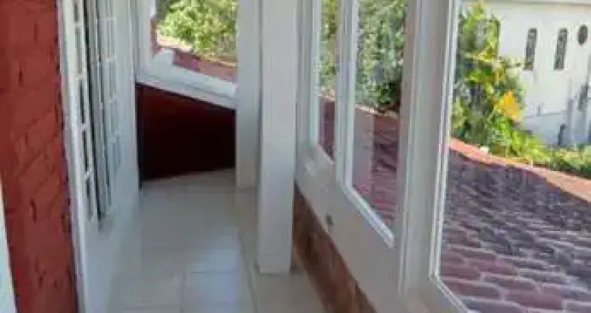 Casa com 3 quartos à venda na Rua Ângelo Passuelo, 190, Vila Nova, Porto Alegre