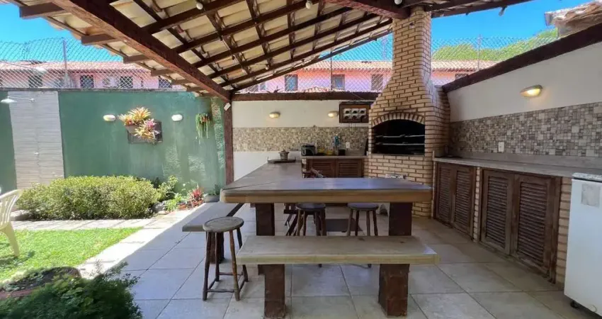 Casa em condomínio a 300 metros da praia de manguinhos, com 3 quartos e área gourmet.