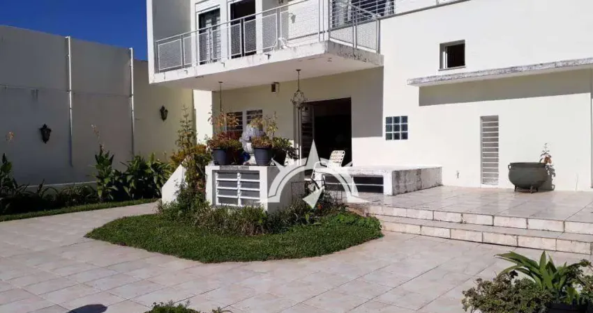 Sobrado com 4 dormitórios à venda, 498 m² por R$ 2.180.000,00 - Vila Jardim - Porto Alegre/RS
