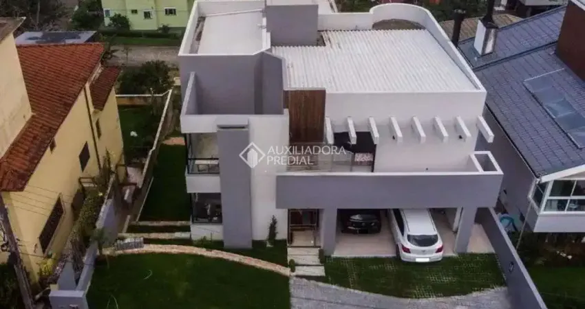 Casa em condomínio fechado com 4 quartos para alugar na Rua Douglas Seabra Levier, 228, Carvoeira, Florianópolis