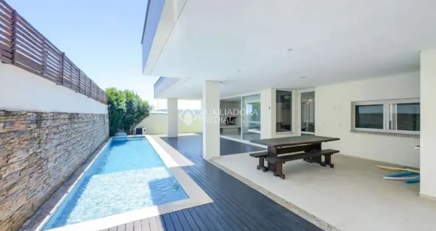 Casa com 4 quartos para alugar na Rua Carlos Drummond de Andrade, 61, Lagoa da Conceição, Florianópolis