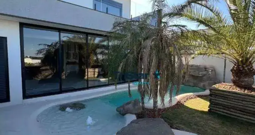 Ca0525 - sobrado com praia artificial e 4 suítes com arquitetura diferenciada em condominio fechado - at. 312m² - ac. 262m² - jardins di roma indaiat