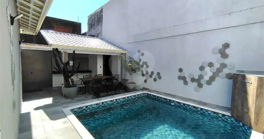 Casa com 4 quartos à venda na Vila Caiçara, Praia Grande 