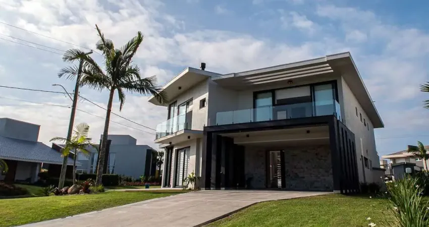 Casa 5 quartos sendo 4 suítes para venda no bairro Itapeva em Torres