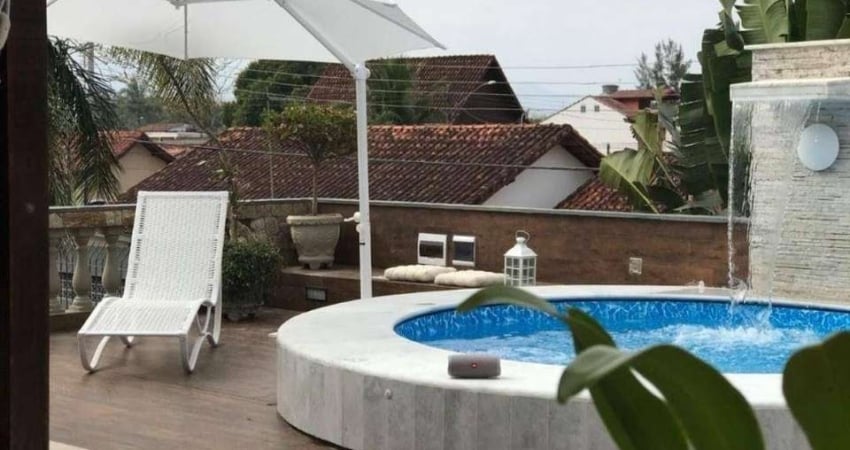 Casa com 4 dormitórios à venda, 293 m² por R$ 1.100.000 - Praia das Palmeiras - Caraguatatuba/SP