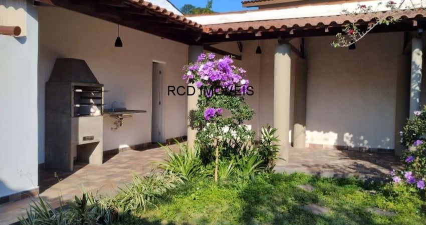 CASA TERREA NO CAXINGUI COM 3 DORMITORIOS E JARDIM, ESTUDA PERMUTA