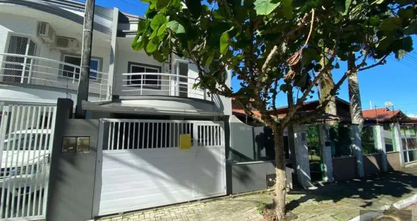 Sobrado germinado 4 dormitórios sendo 1 suíte + 1 vaga de garagem pagamento facilitado proprietário em meia praia de itapema