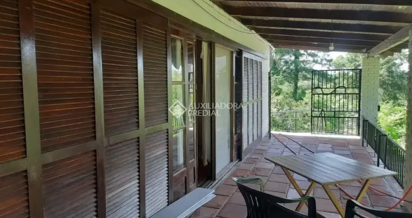 Casa com 3 quartos à venda na Estrada Kanazawa, 1045, Vila Nova, Porto Alegre