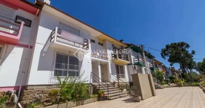 Casa em condomínio fechado com 3 quartos à venda na Rua Joaquim Cruz, 331, Santo Antônio, Porto Alegre