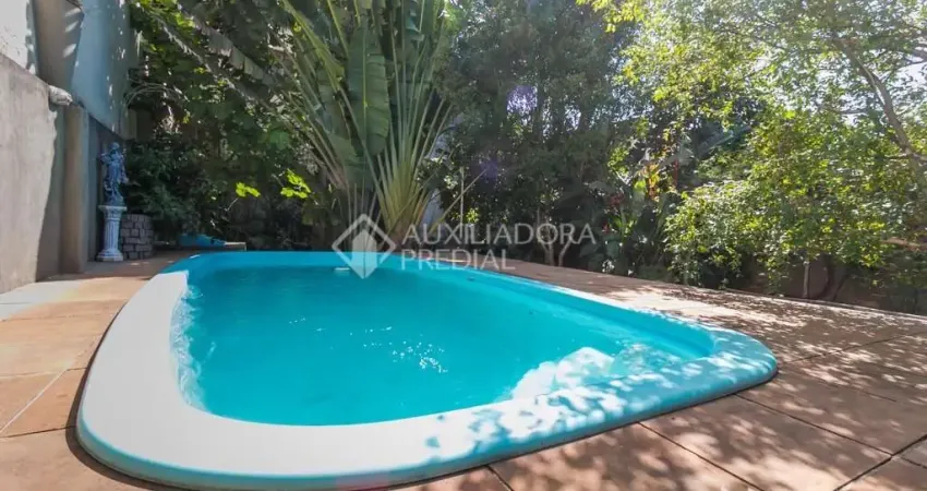 Casa em condomínio fechado com 3 quartos à venda na Rua Márcio Dias, 196, Nonoai, Porto Alegre