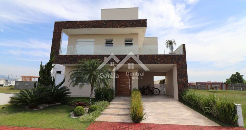 Casa em condomínio fechado com 4 quartos à venda na Avenida Padre Anchieta, 2050, Flora Rica, Peruíbe
