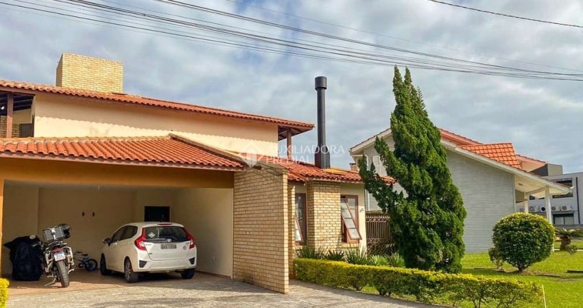 Casa em condomínio fechado com 4 quartos à venda na Rodovia Haroldo Soares Glavan, 3874, Cacupé, Florianópolis