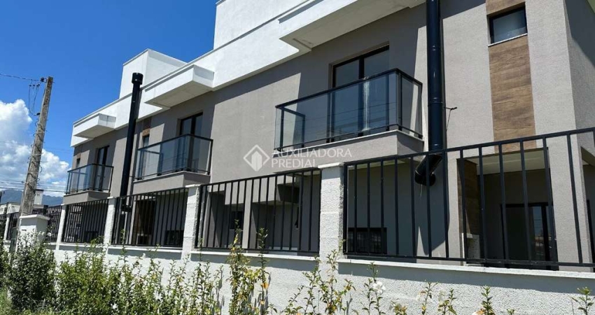 Casa em condomínio fechado com 3 quartos à venda na Avenida Aleixo Alves de Souza, 892, Nova Palhoça, Palhoça