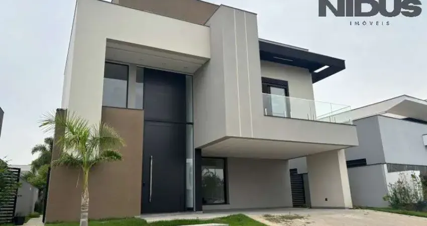 Luxuosa casa à venda em Alphaville Nova Esplanada 4, Votorantim-SP: 4 quartos, 4 suítes, 2 salas, 5 banheiros, 4 vagas de garagem.