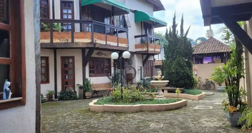 Casa em condomínio fechado com 2 suítes venda, 240 m² por R$ 680.000 - praia da enseada - Guarujá/SP